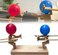 BalloonBrawlers handgefertigte Holzpuppen für Ballonschlachten