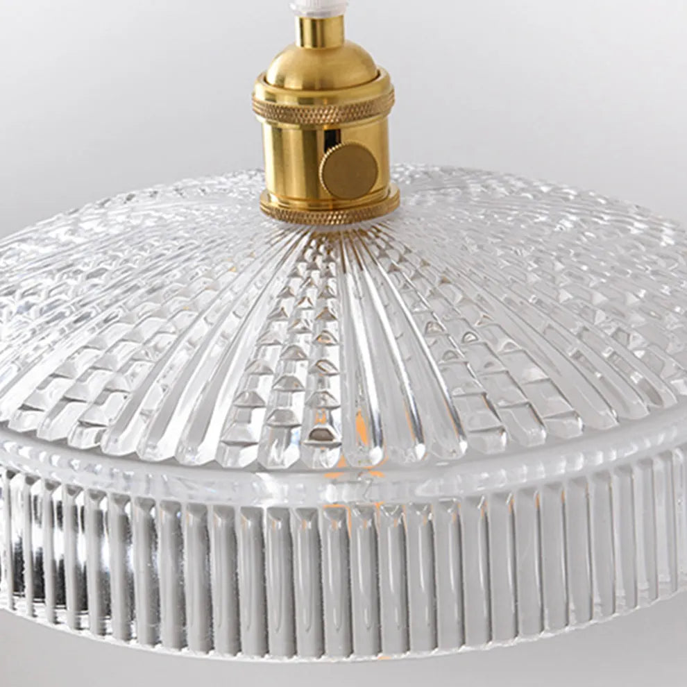 Art Deco závěsné světlo – průhledné foukané sklo s mosazným povrchem do ložnice - Flindria
