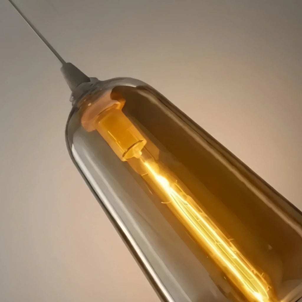Nowoczesna szklana lampa wisząca — bursztynowa do jadalni - Flindria