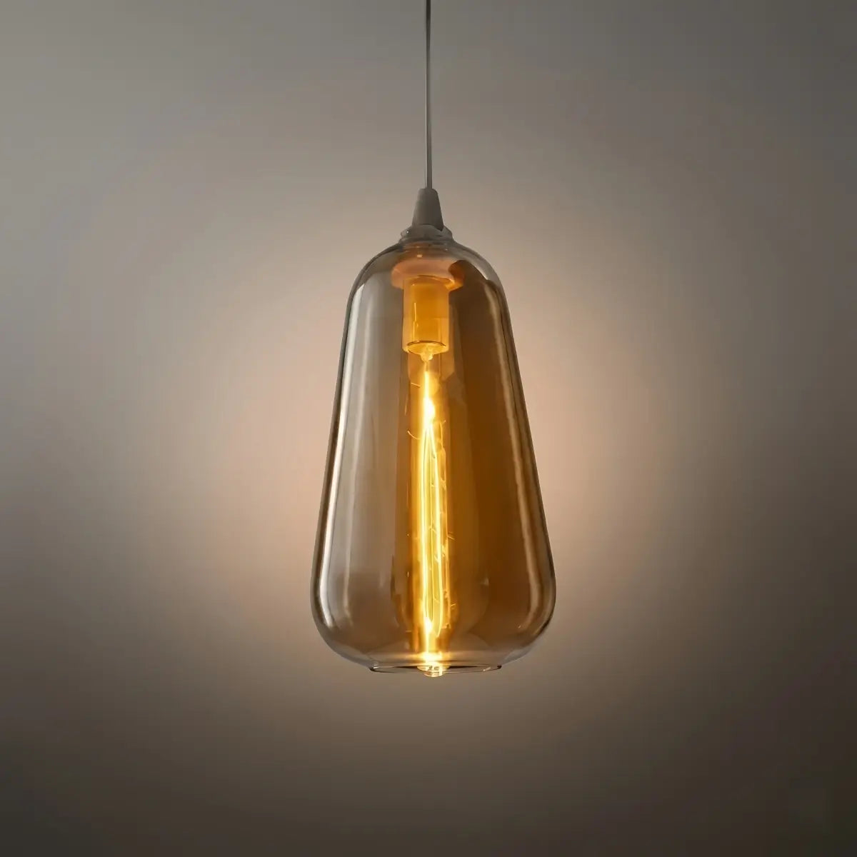 Nowoczesna szklana lampa wisząca — bursztynowa do jadalni - Flindria