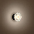 Modern Outdoor Wall Lamp - Clear Glass & Metal Round Design for Patio - Flindria