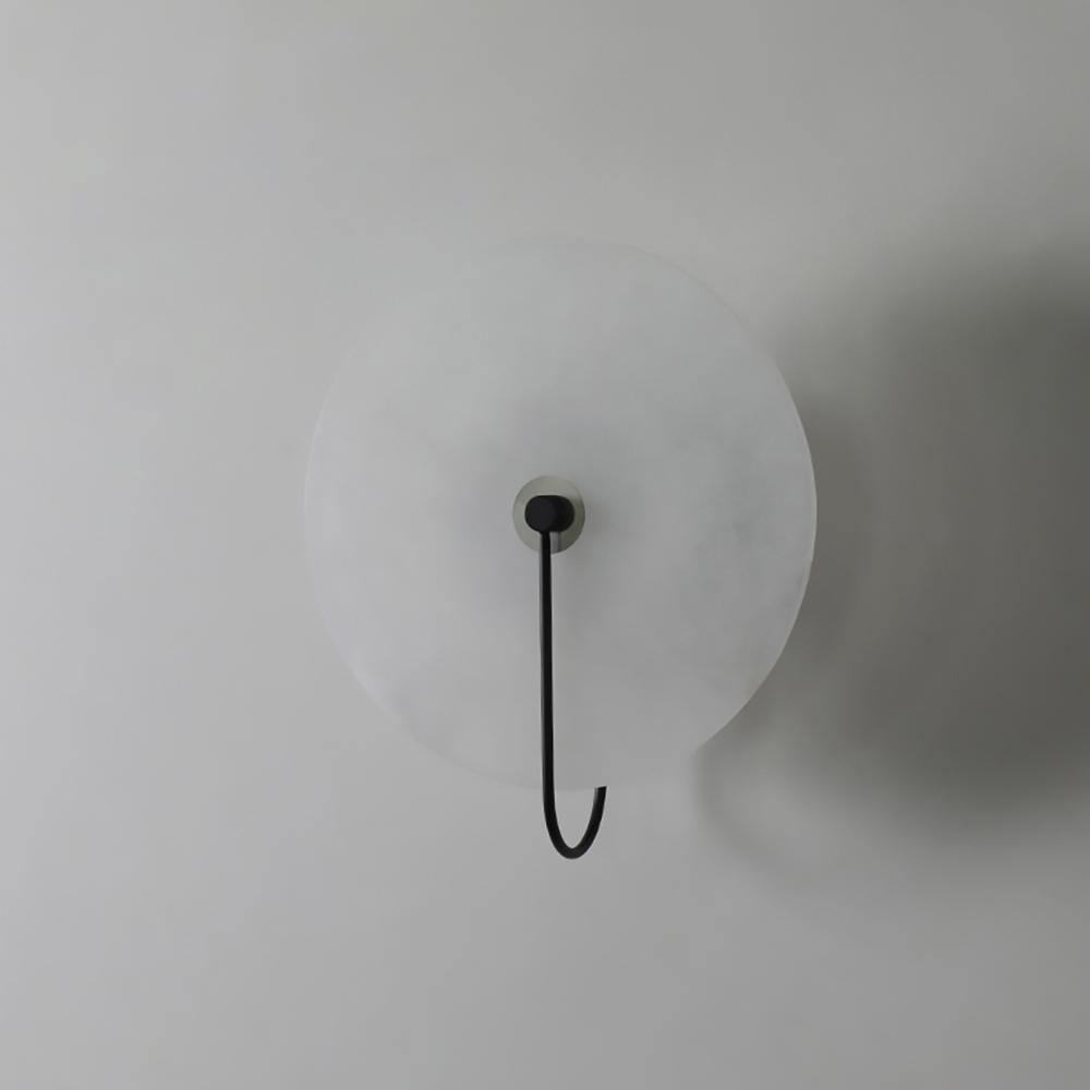 Alabaster LED Disc Wall Sconce — Warm Light, Black Arm