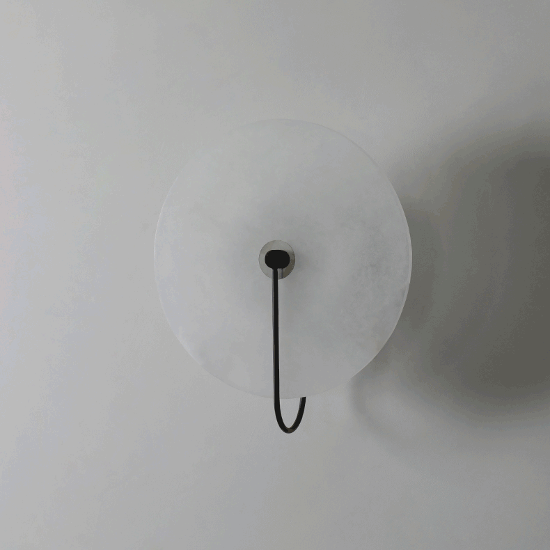 Alabaster LED Disc Wall Sconce — Warm Light, Black Arm