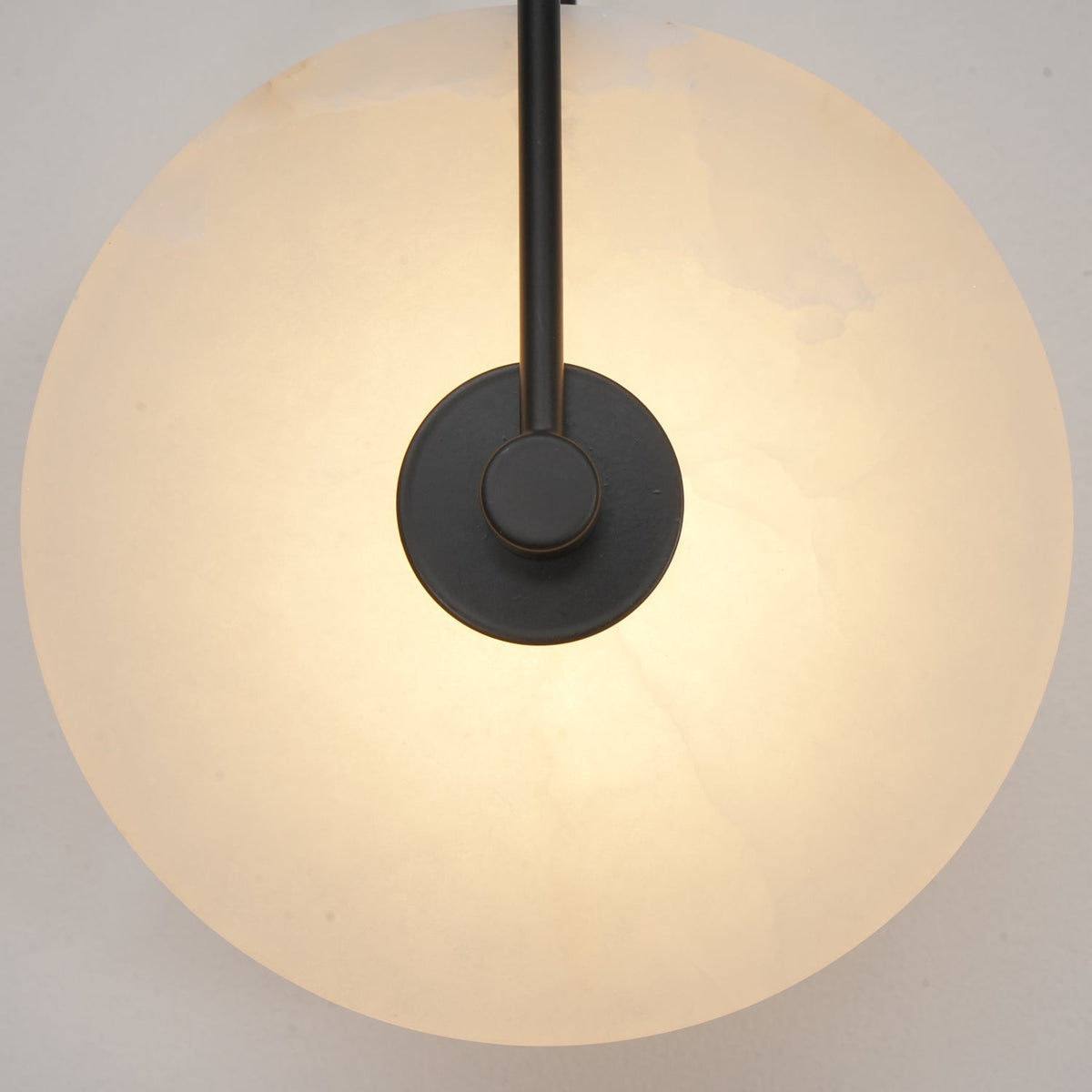 Alabaster LED Disc Wall Sconce — Warm Light, Black Arm