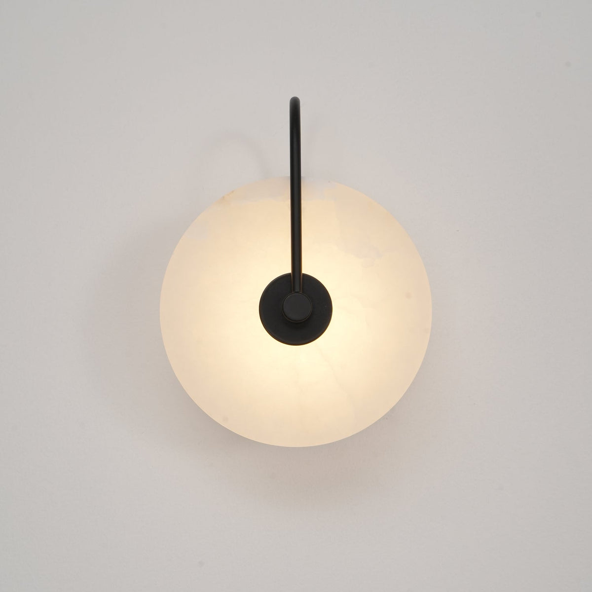 Alabaster LED Disc Wall Sconce — Warm Light, Black Arm