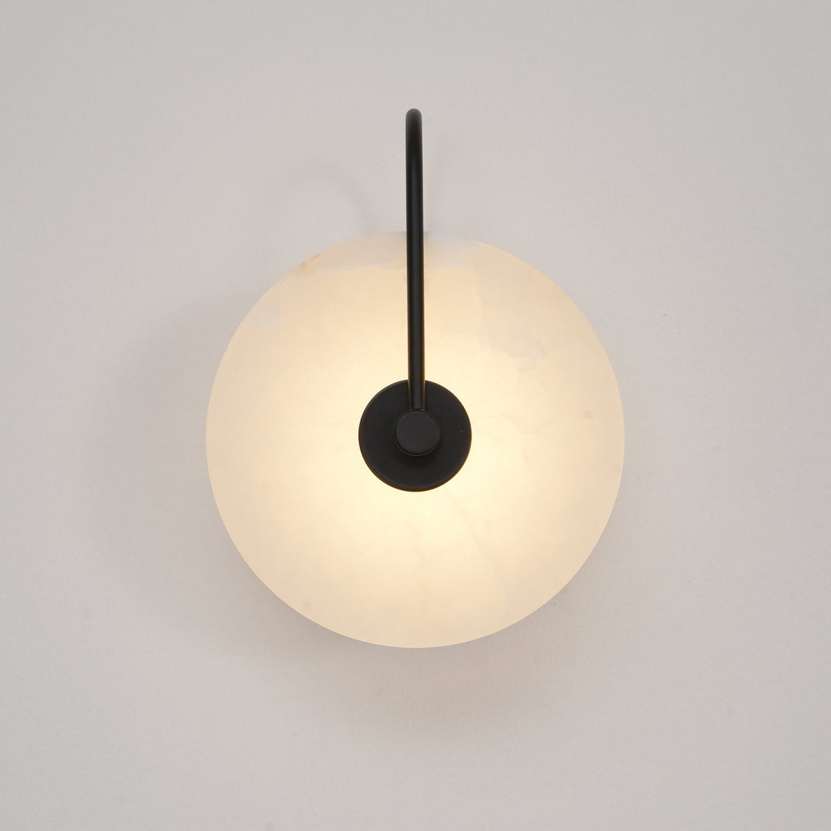 Alabaster LED Disc Wall Sconce — Warm Light, Black Arm