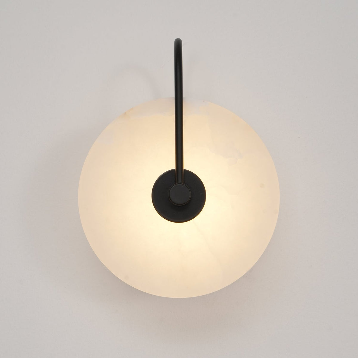 Alabaster LED Disc Wall Sconce — Warm Light, Black Arm