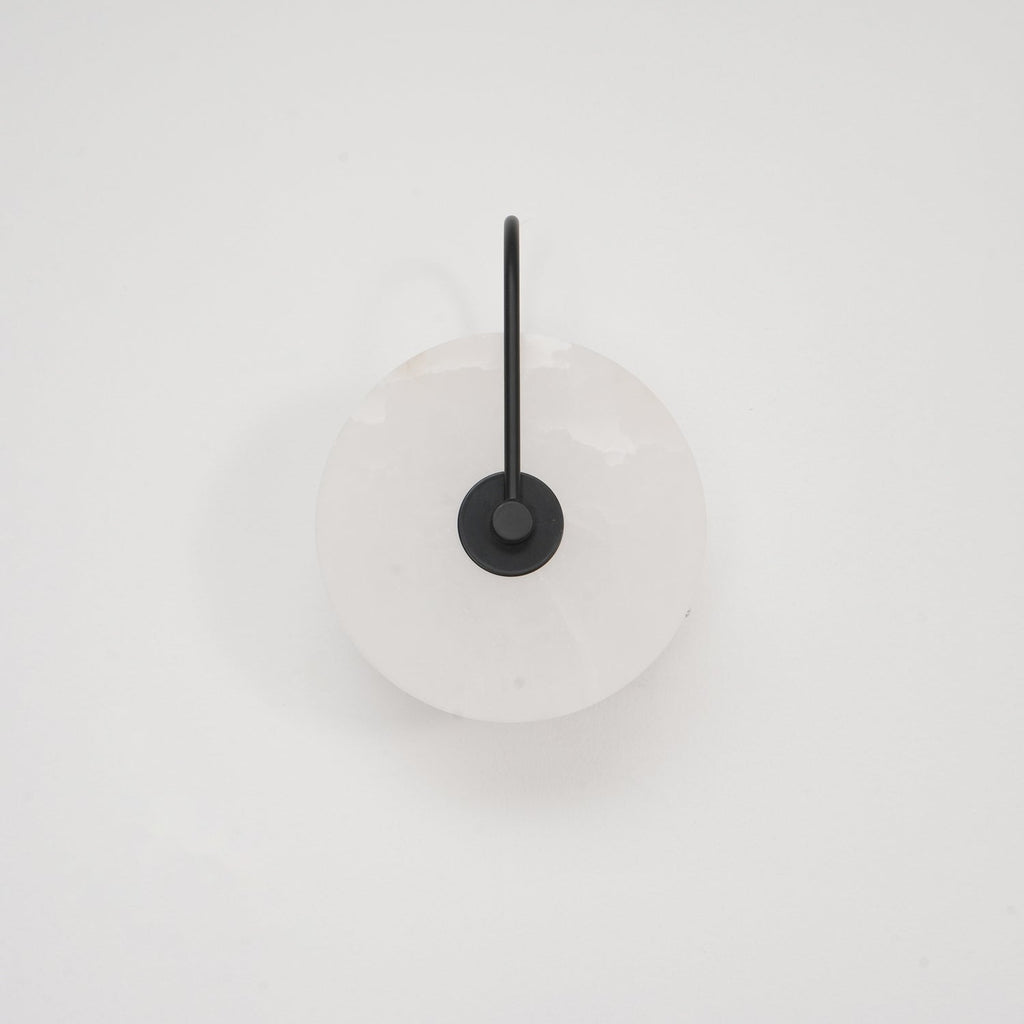 Alabaster LED Disc Wall Sconce — Warm Light, Black Arm