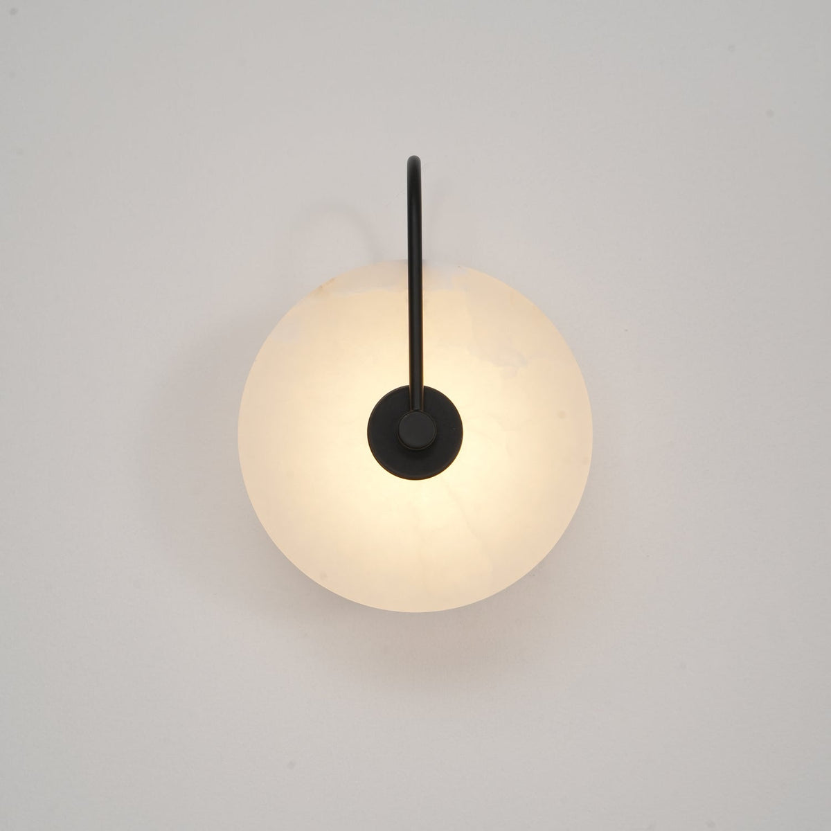 Alabaster LED Disc Wall Sconce — Warm Light, Black Arm