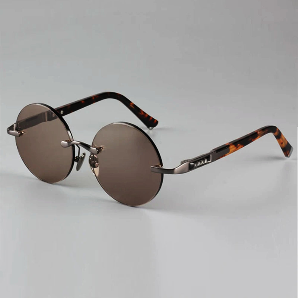 Óculos de sol redondos retro - design sem armação, proteção UV