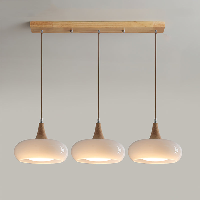 Suspension Eloria — abat-jour en verre ambré, partie supérieure en bois