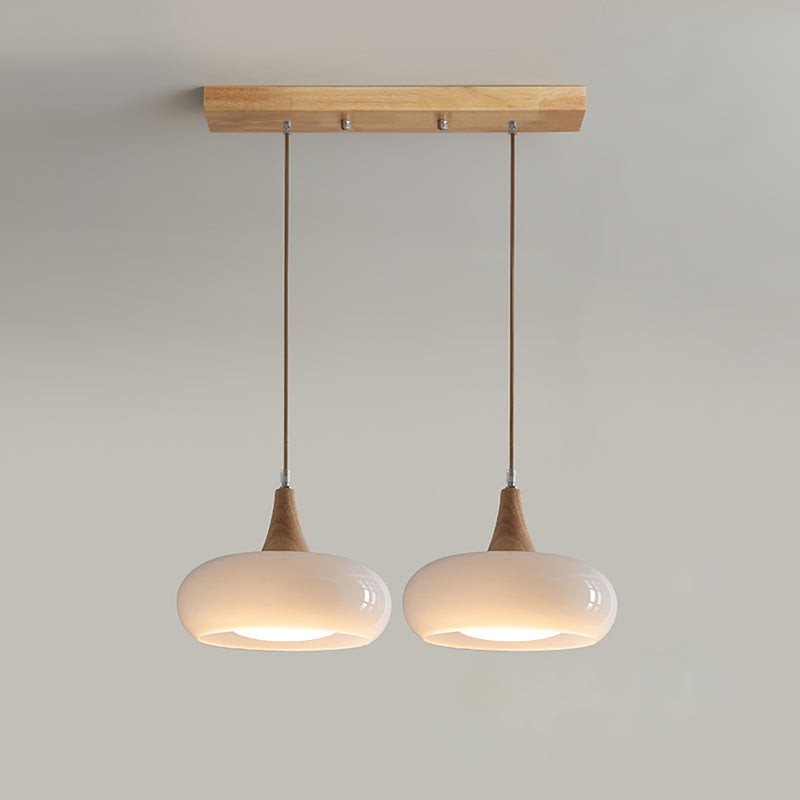 Suspension Eloria — abat-jour en verre ambré, partie supérieure en bois