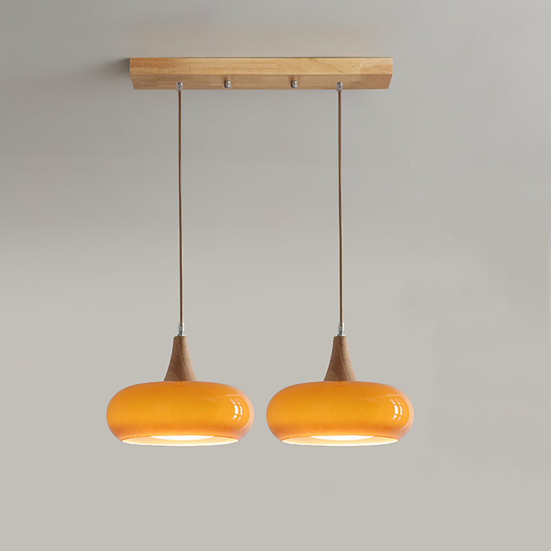 Suspension Eloria — abat-jour en verre ambré, partie supérieure en bois