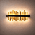 Aplique de pared lineal moderno en forma de carámbano – Hierro y acero negro/dorado pulido para sala de estar - Flindria