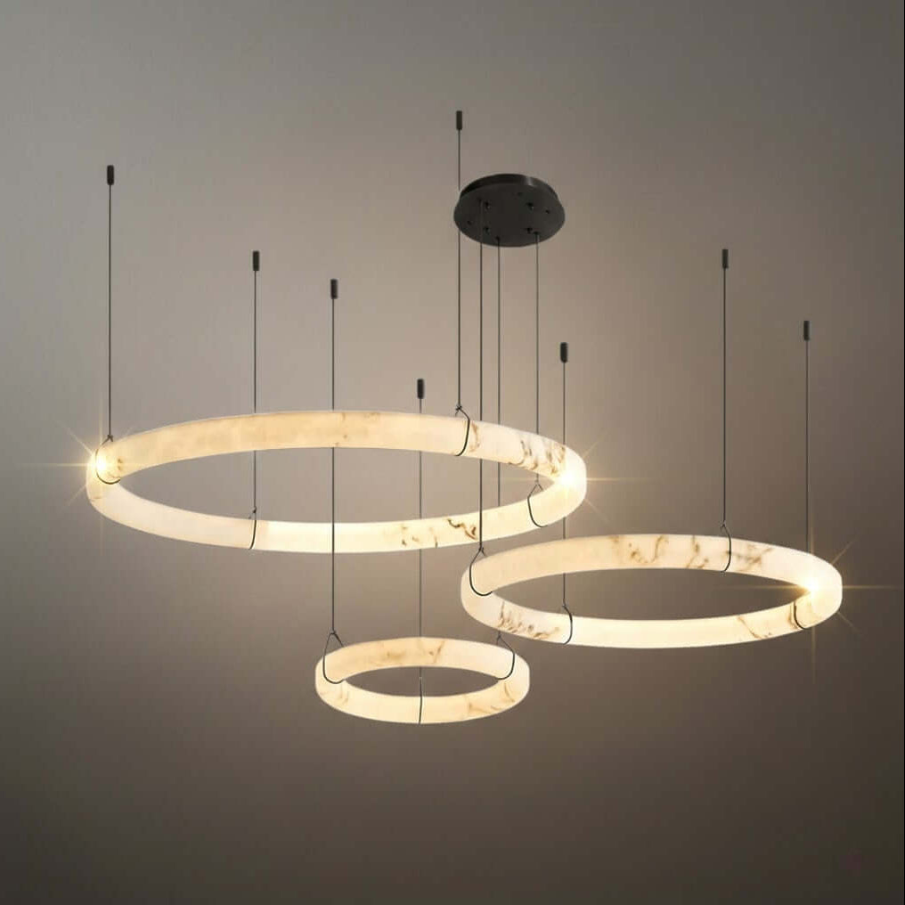 Modern Alabaster Ring Pendant Lamp — Hand-Carved Stone & Black Metal for Dining Room - Flindria
