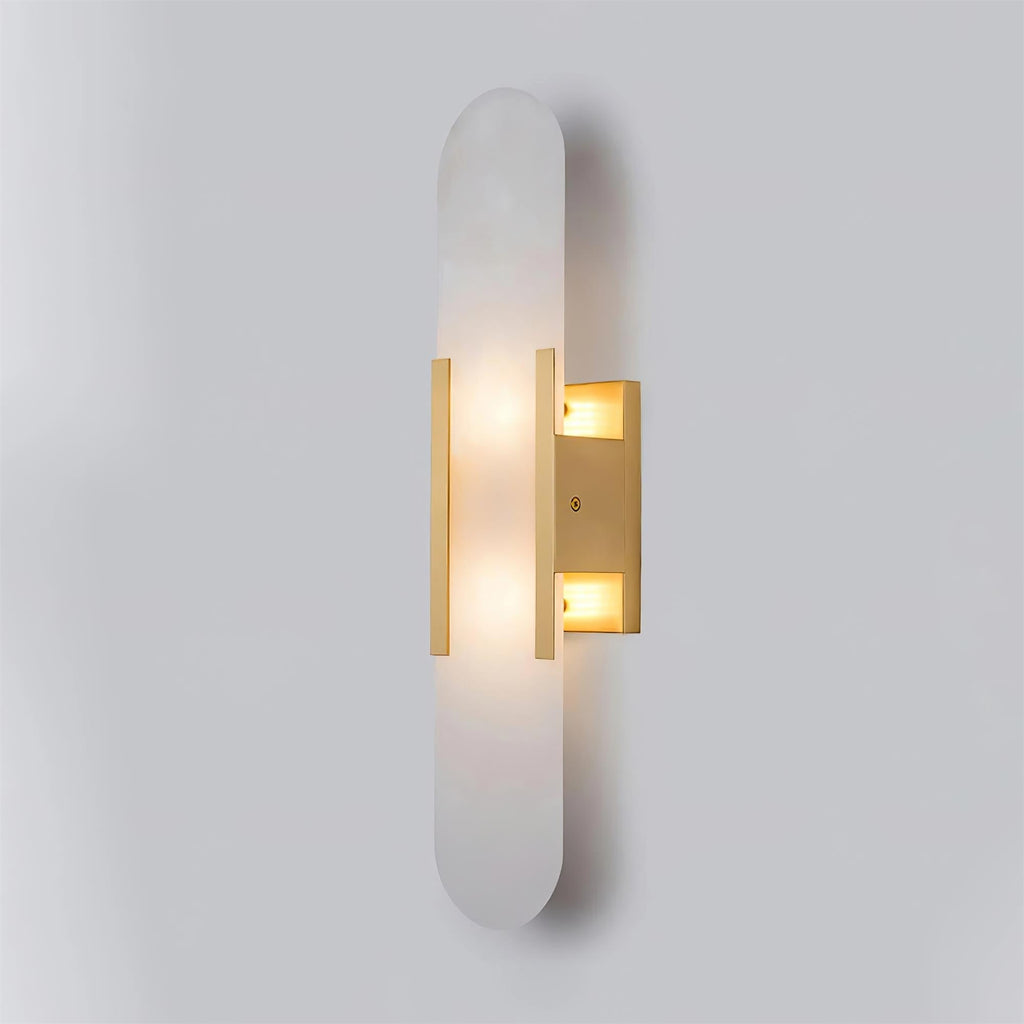 Lunara vägglampa i alabaster — distinkt ådring, mjukt varmt sken