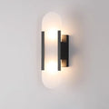 Lunara vägglampa i alabaster — distinkt ådring, mjukt varmt sken