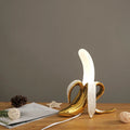 Lámpara de mesa BananaShine con forma de plátano — Luz decorativa moderna y divertida