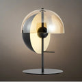 Moderní stolní lampa – Železo a sklo, protínající se hemisféry do ložnice - Flindria