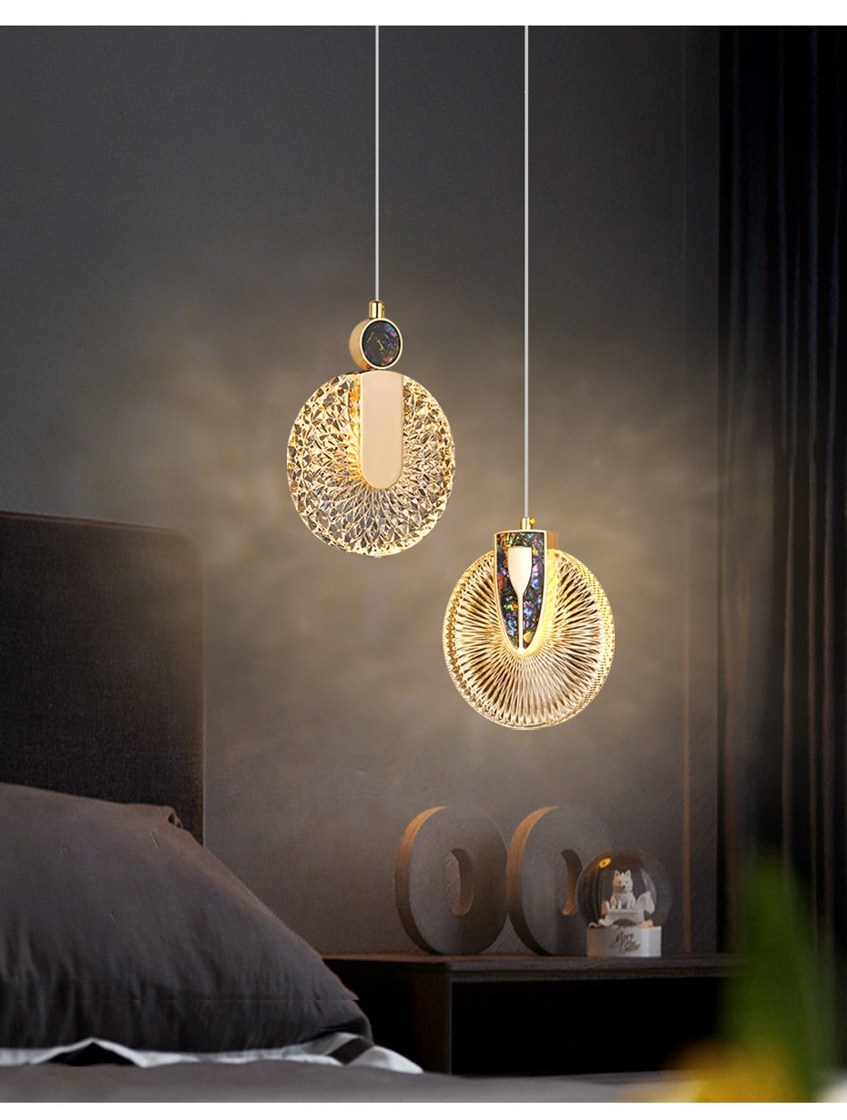 Lámpara colgante redonda de cristal con LED dorado Aurelia