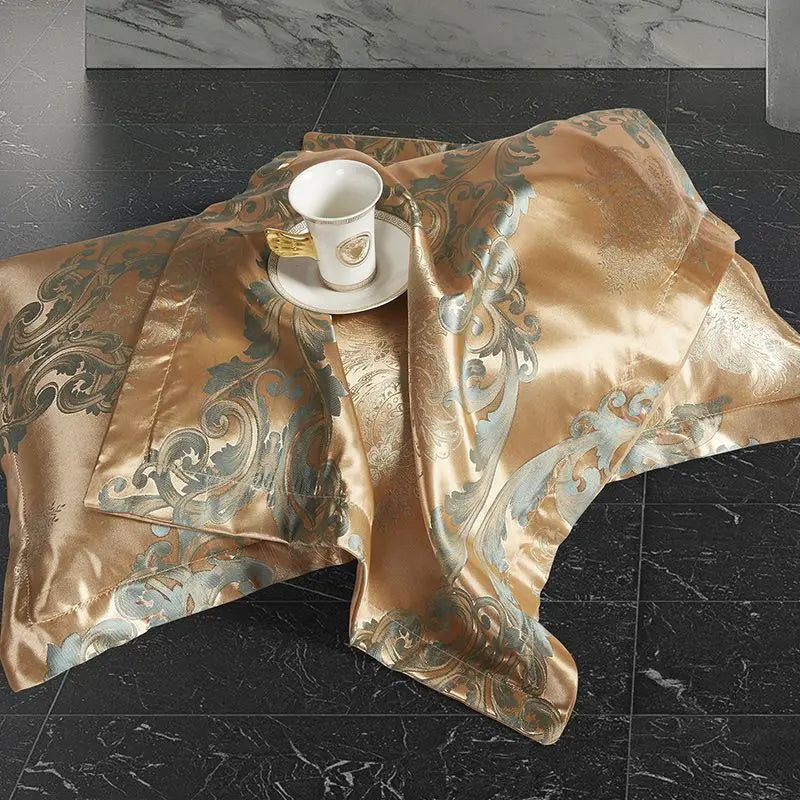 Aurelume sängset i satinjacquard — blått och guld