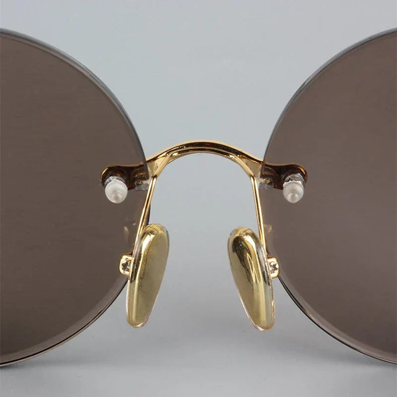 Kristallklare rahmenlose Sonnenbrille — UV400-Antireflexgläser