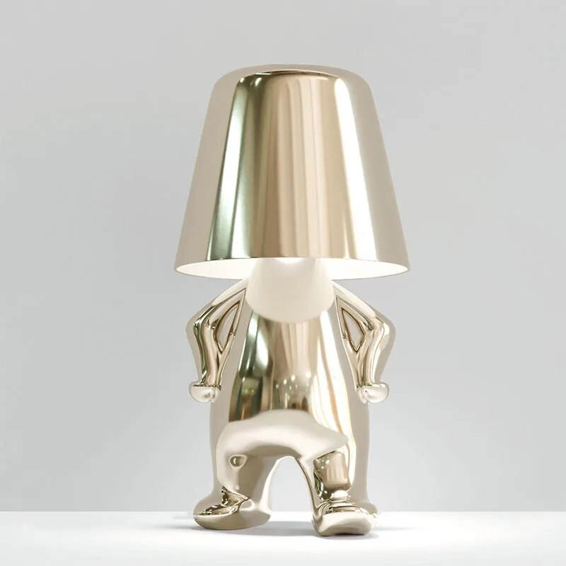 Goudje LED-Tischleuchte aus Kunstharz — skulpturales Denker-Design