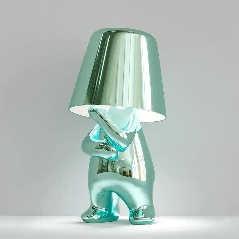 Goudje LED-Tischleuchte aus Kunstharz — skulpturales Denker-Design