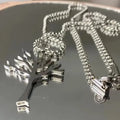 Halsband med bladlöst träd — 50 cm kedja, polerad finish