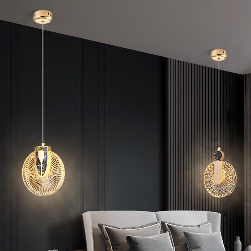 Lámpara colgante redonda de cristal con LED dorado Aurelia