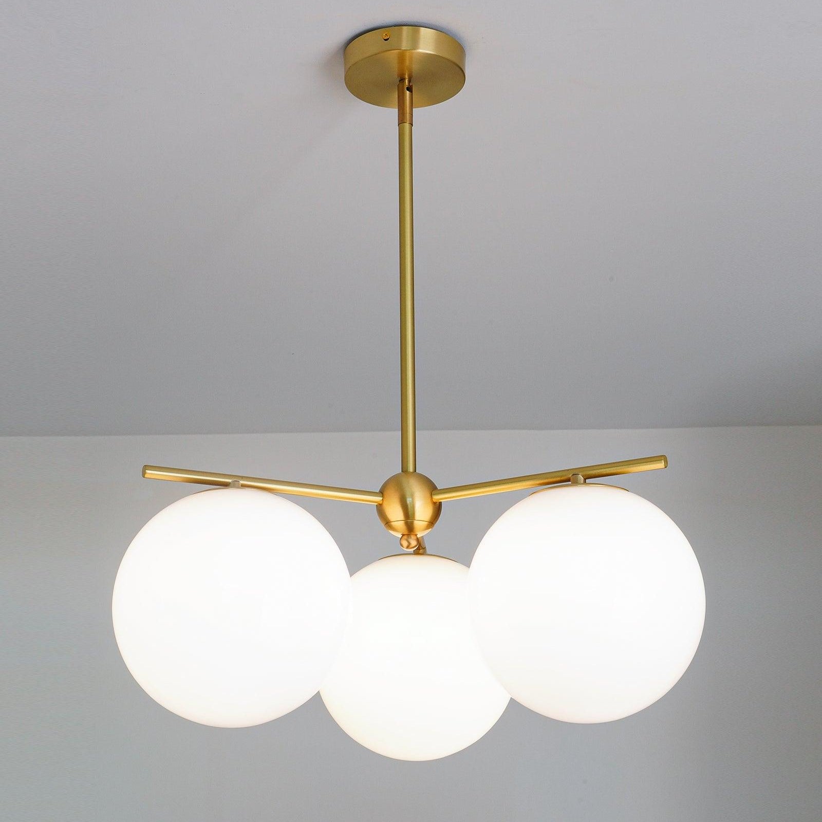 Elara Brass Chandelier With Glass Orbs For Dining Room Decor