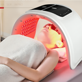 LumiDerm LED-ansigtsbehandlingsenhed med flere farver — indstilling med rødt lys