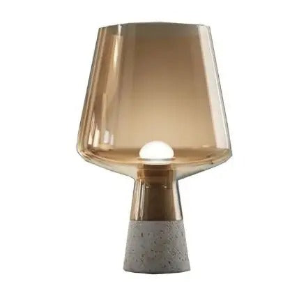 Leimu bordslampa — skärm i bärnstensfärgat glas, bas i cement