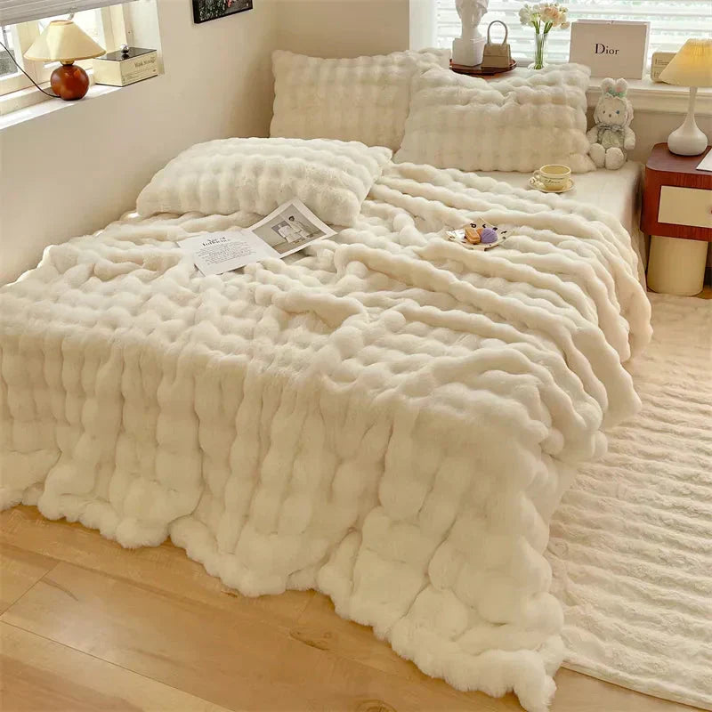 Manta de peluche em pelo sintético ultramacio com padrão de bolhas