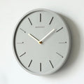 Horloge murale en ciment nordique Fjordline — Suspension métallique minimaliste